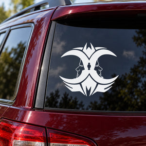 White two-moon decal with symmetrical wolf faces on car rear window
