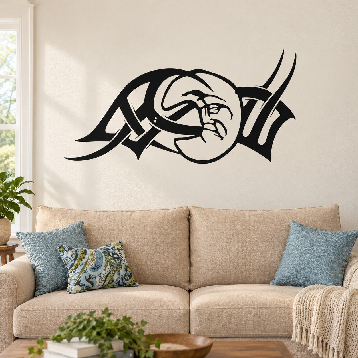 Black stylized moon wall decal with tribal face design