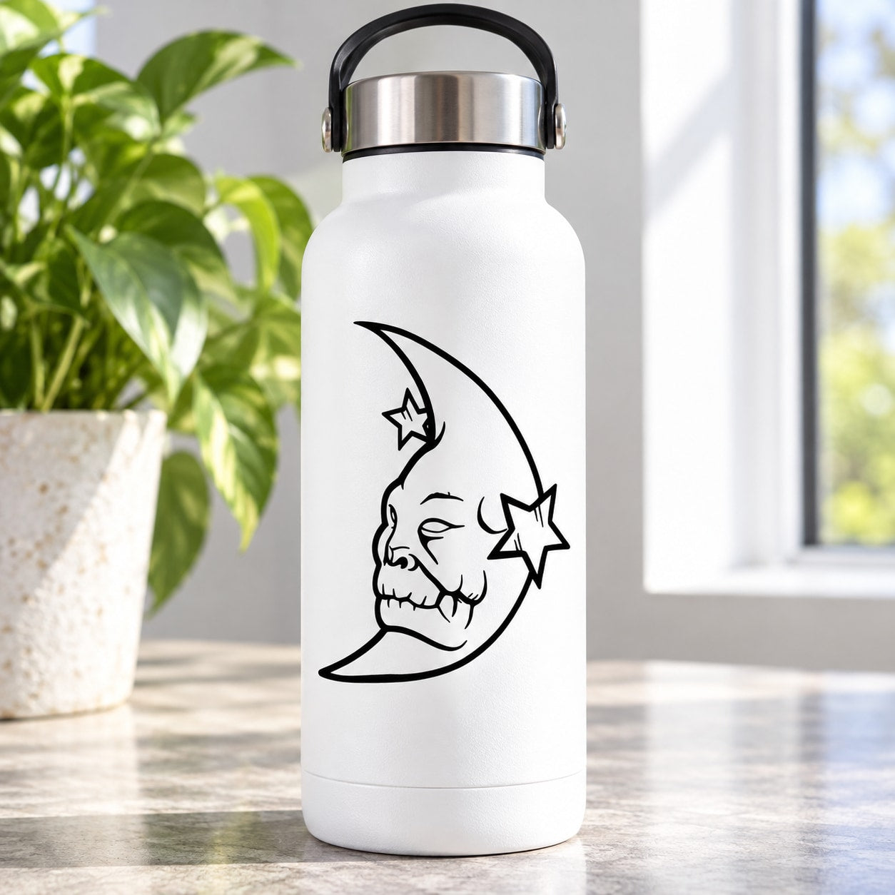 Moon decal sticker with demon face and star outlines on a white bottle