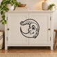 Moon wall decal with black line-art face and crescent design
