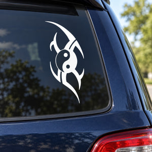 Spiked yin-yang moon decal with white graphic on car window
