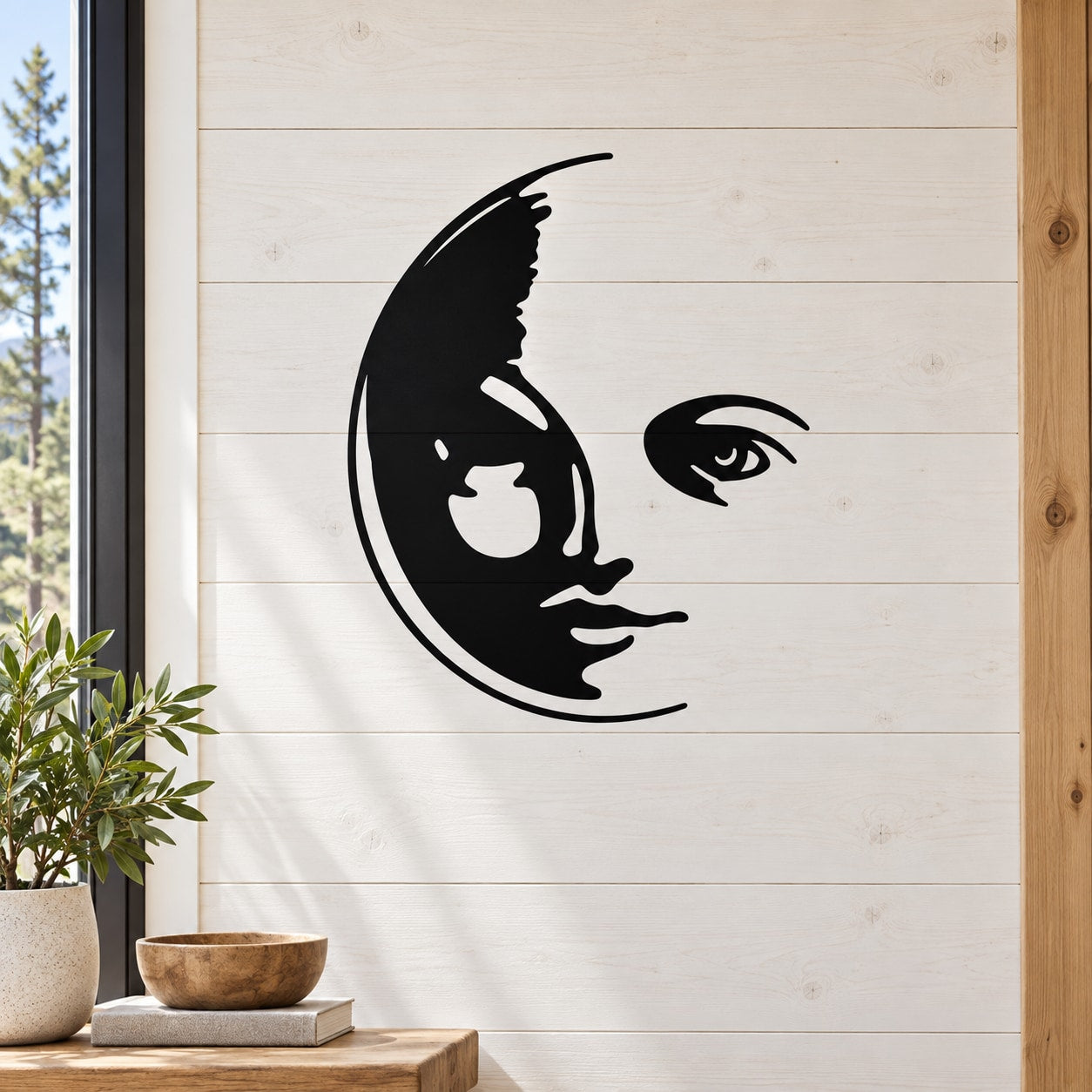 Girl moon wall decal featuring black silhouette of a girl on a crescent moon