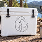 Moon-shaped decal with a distressed face and a small figure