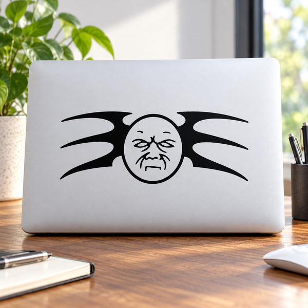 Grumpy tribal moon decal with angry face and wing-like tribal lines
