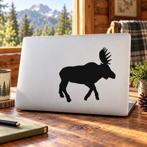 Sprinting moose decal with black running silhouette on light surface