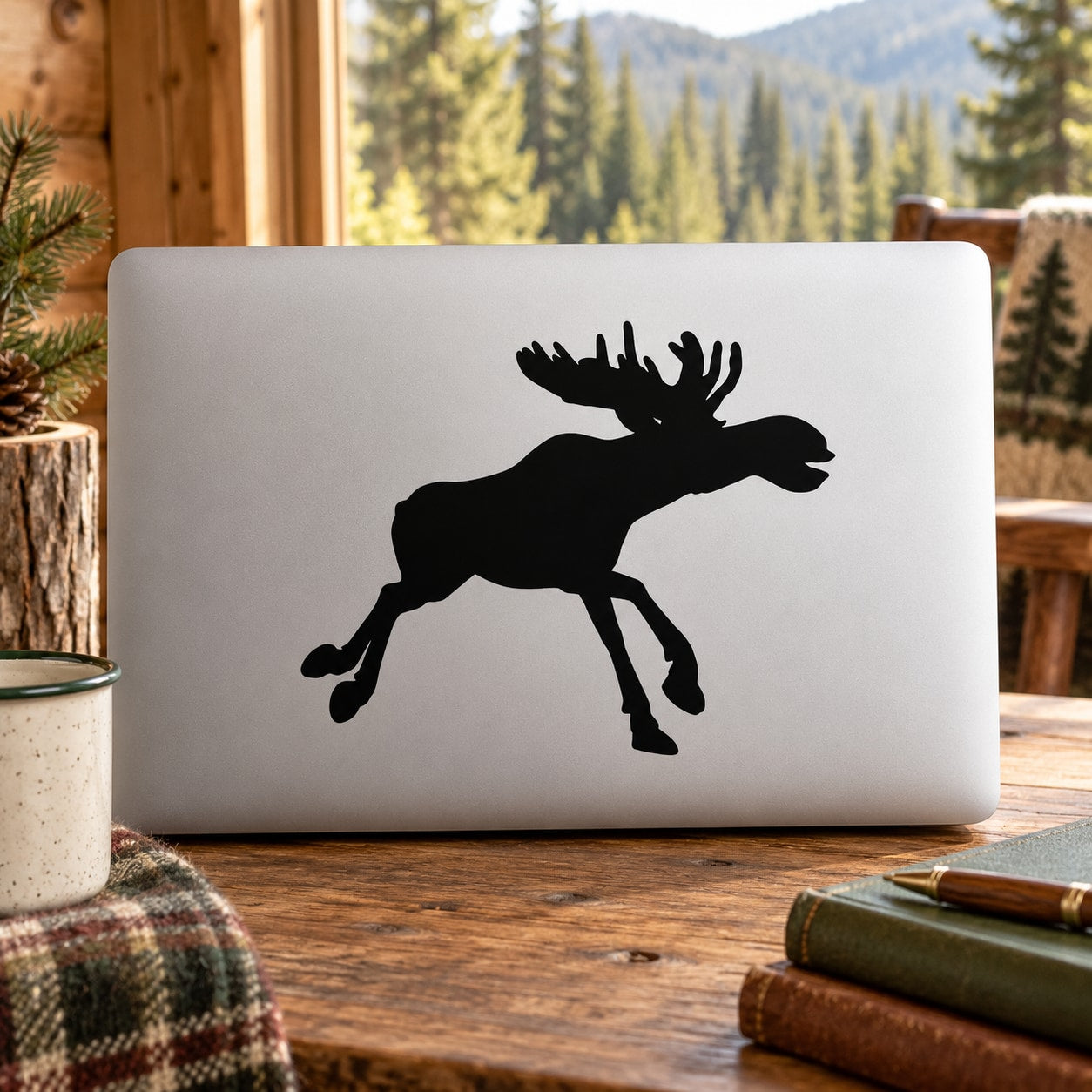 Running moose silhouette decal, black on white rectangular sheet