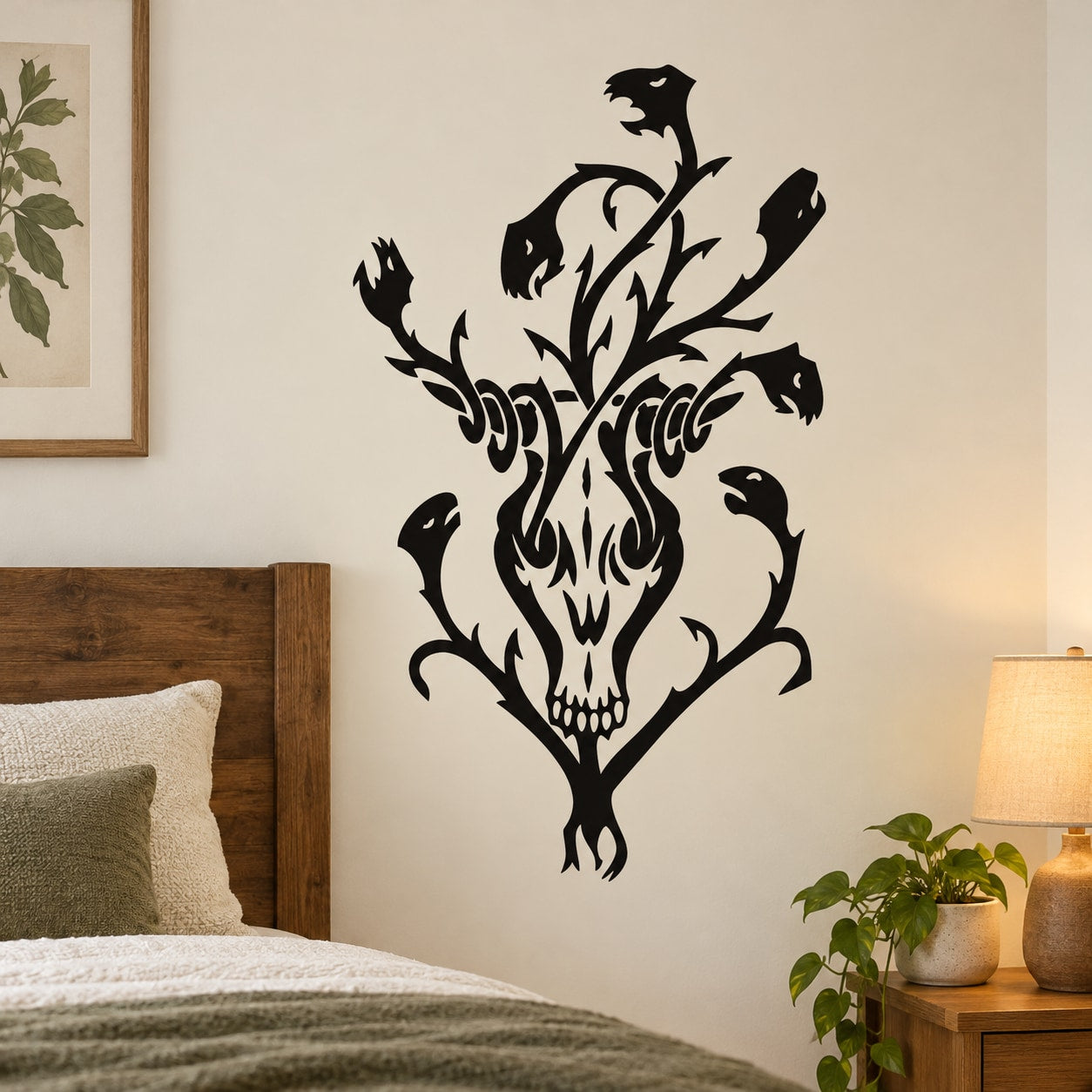 Black skull floral wall decal with swirling leaves and bat-like shapes