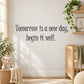 Wall decal quote: 'Tomorrow is a new day, begin it well.' lettering