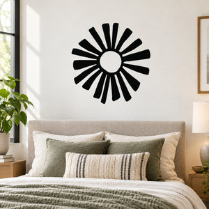 Sun flower wall decal with bold black sunburst rays and white center circle