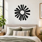 Sun flower wall decal with bold black sunburst rays and white center circle