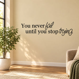 Inspirational wall decal: cursive quote “You never fail until you stop trying.”