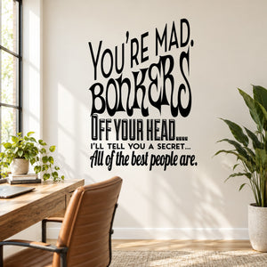 Black typographic wall decal with phrase “You’re mad bonkers off your head”