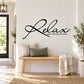 Black wall decal with cursive Relax and Take One Day at a Time text