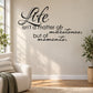 Inspirational wall decal with cursive quote: Life isn't a matter of milestones, but of moments.