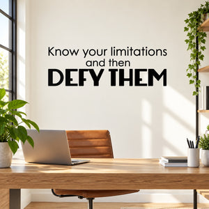 Inspirational wall decal text: 'Know your limitations and then DEFY THEM'