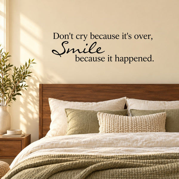 Wall quote decal with "Don't cry because it's over, Smile because it happened" text