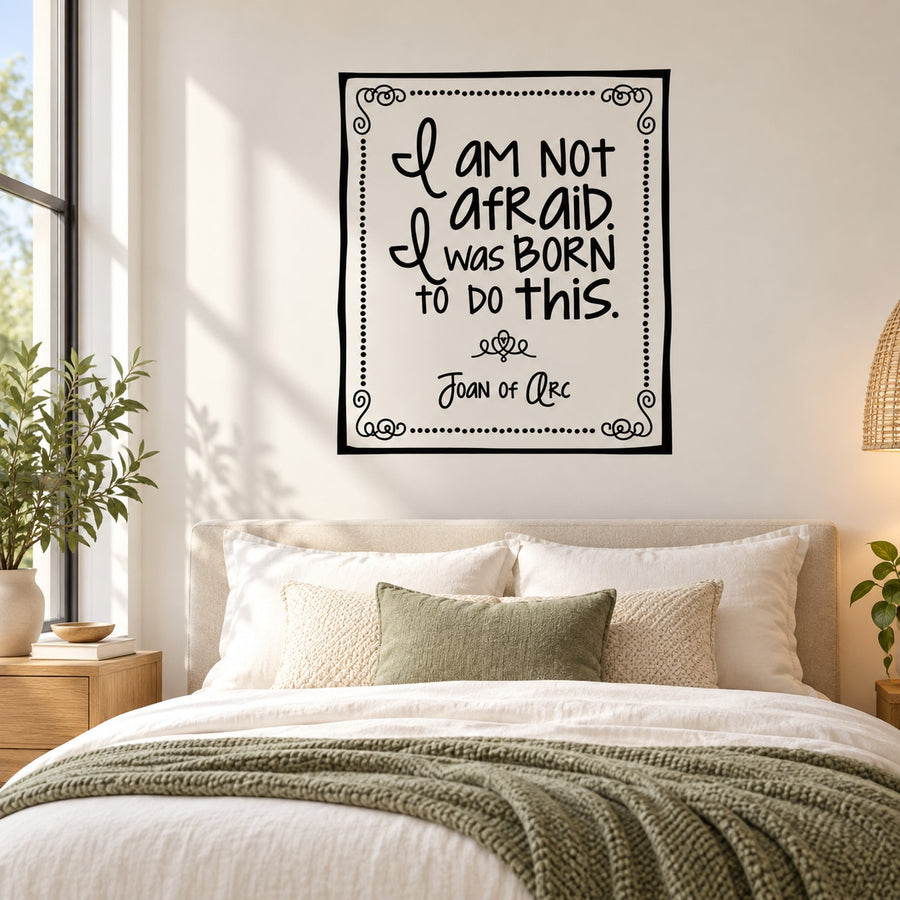 Square wall decal with black hand-lettered quote and ornate border