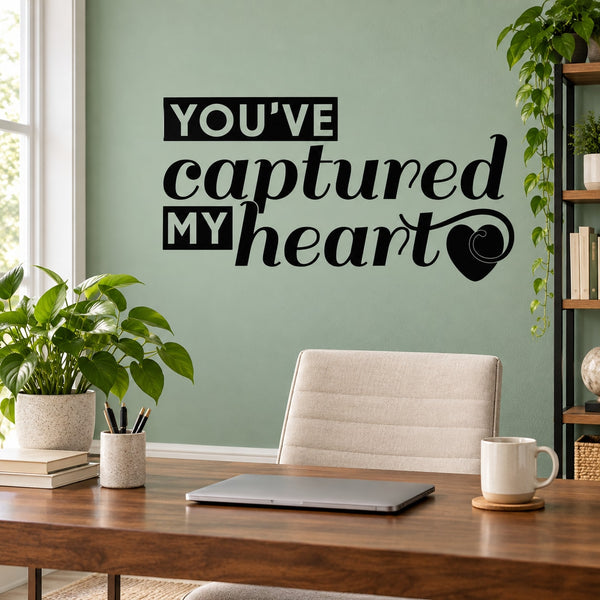 Black heart wall decal with bold text "You've captured my heart"