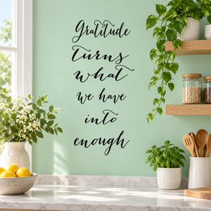 Gratitude wall decal, cursive quote: 'Gratitude turns what we have into enough'