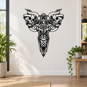 Motorcycle decal with three skulls and banner crest, black line art on light surface