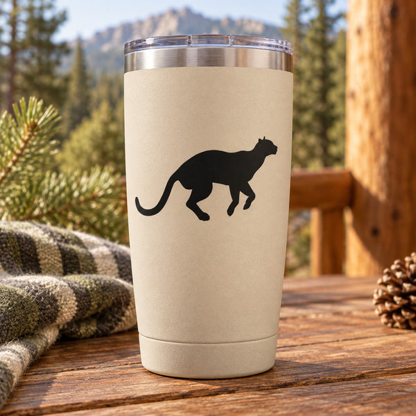 Black mountain lion ready-to-jump decal on a white tumbler