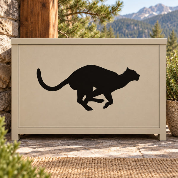 Black dashing mountain lion decal on rectangular tan sign
