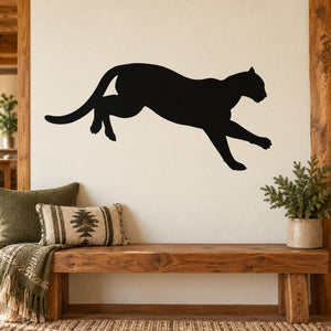 Black mountain lion landing wall decal, silhouette of cat crouching in mid-stride