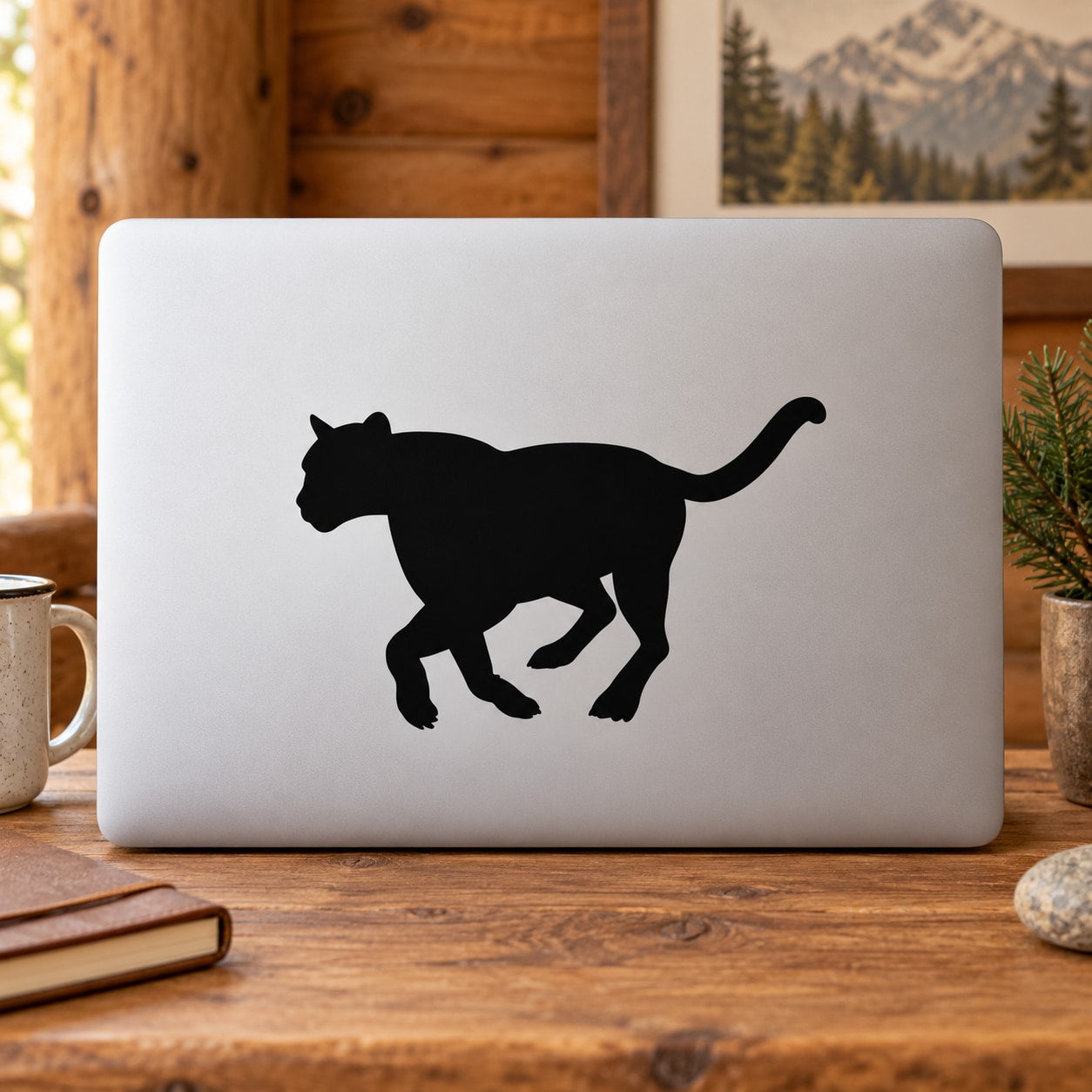 Black mountain lion chasing decal silhouette on light background