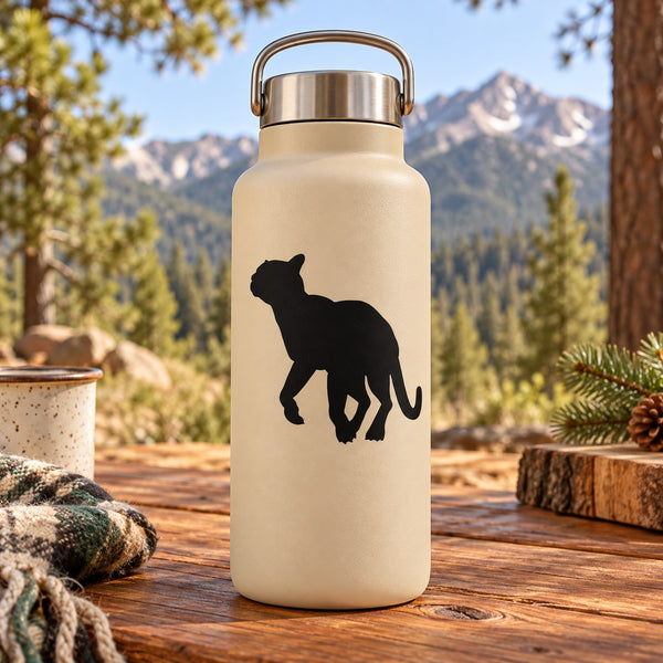 Mountain lion ready-to-leap decal in black on beige water bottle