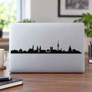 Black Munich skyline silhouette decal on white laptop lid