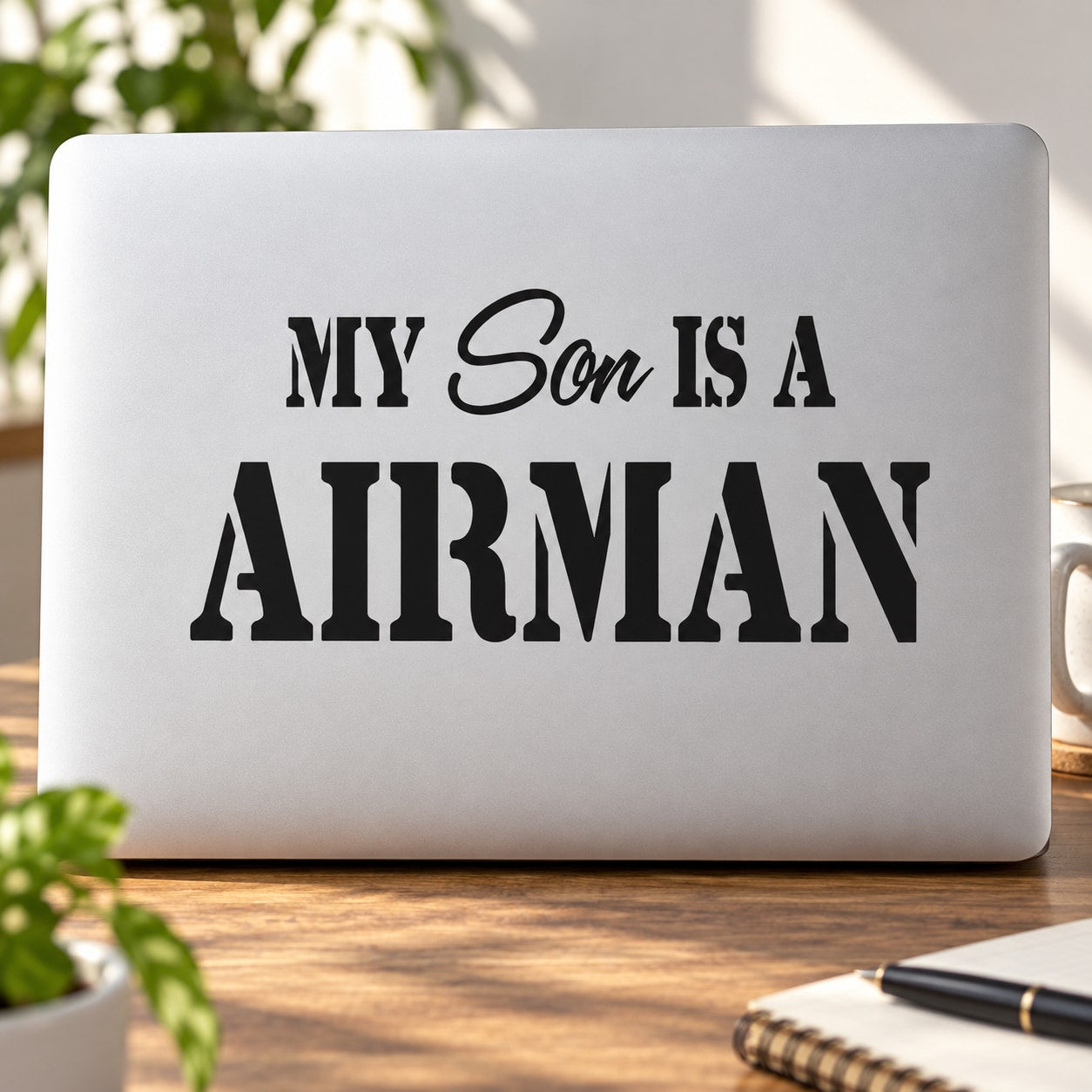 Car decal with black typography: 'My Son Is a Airman'