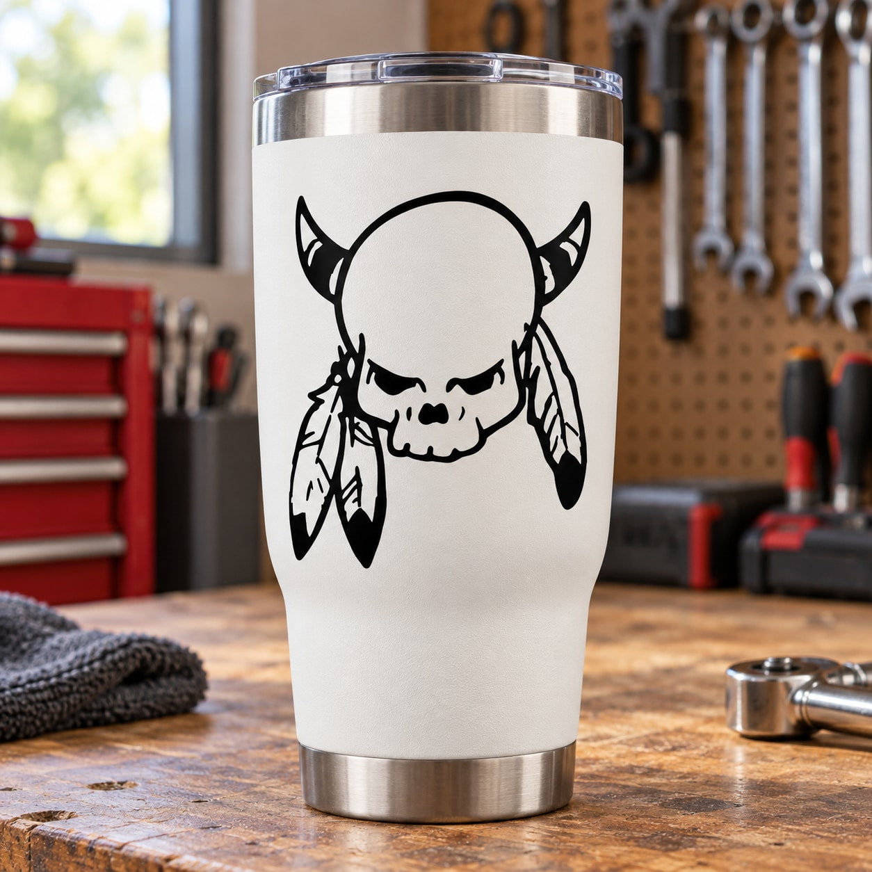 Skull with horned skull and feather vinyl decal, black outline on white background