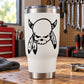 Skull with horned skull and feather vinyl decal, black outline on white background