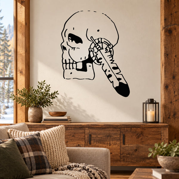 Black skull holding feather vinyl wall decal