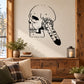 Black skull holding feather vinyl wall decal