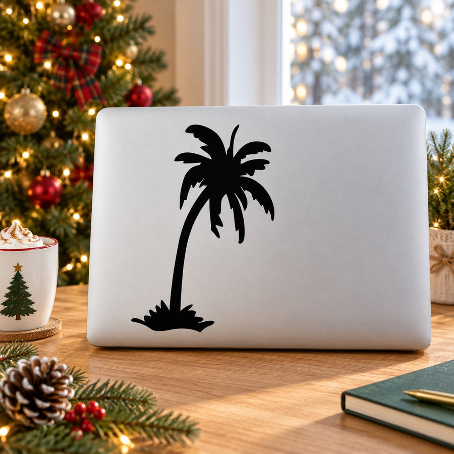 Black palm tree decal silhouette on a light surface
