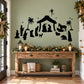 Black nativity scene wall decal with star, stable, figures, and animals.