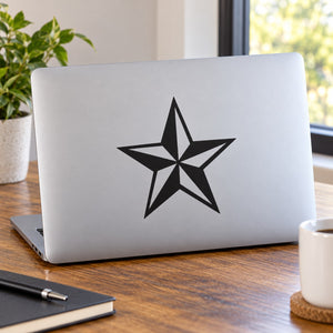 Nautical star decal: black five-point star on a light laptop lid