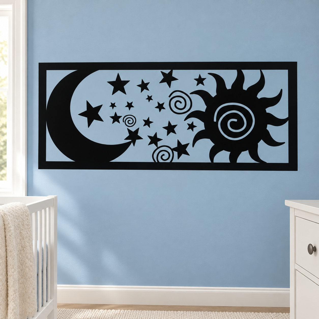 Black moon, sun and stars wall decal in a rectangular frame