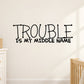 Wall decal reading 'TROUBLE' and 'is my middle name'