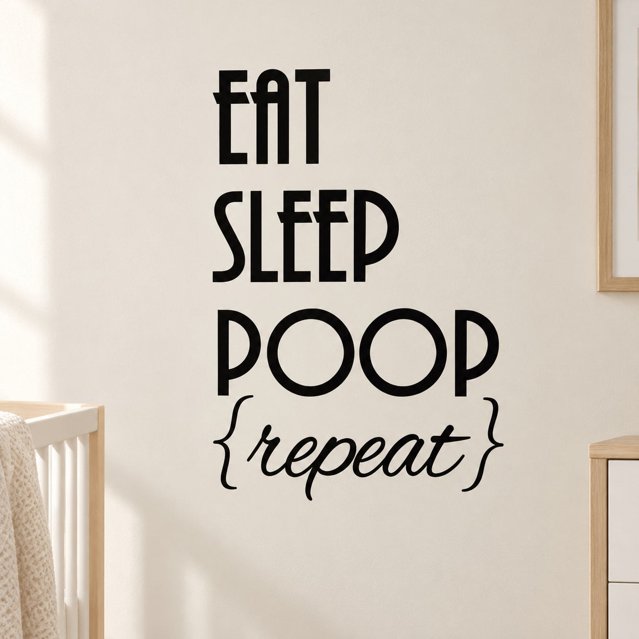 Black wall decal with stacked text: EAT SLEEP POOP repeat