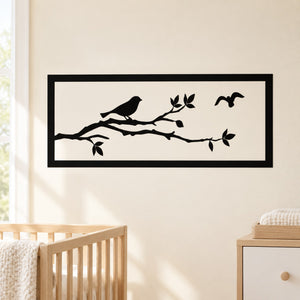 Black tree branch and bird wall decal with small leaves and butterfly accents