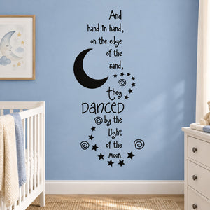 Nursery wall decal with black crescent moon, stars, and cursive dance text