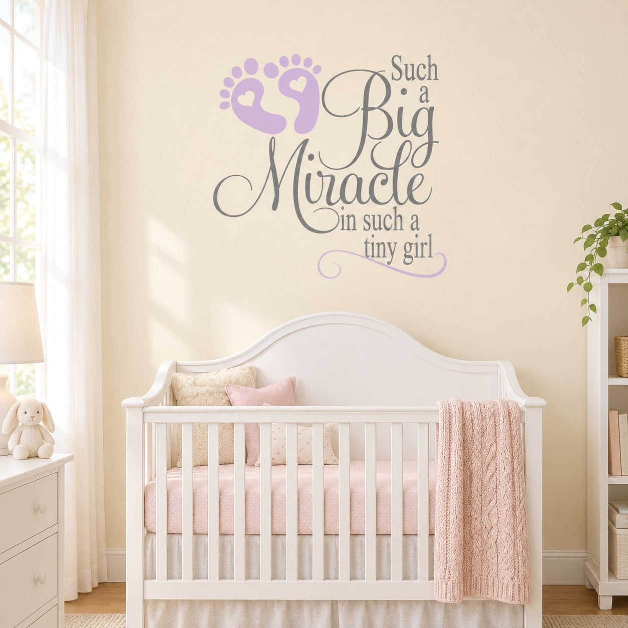 Wall decal with purple footprints and quote "Such a Big Miracle"