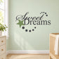 Sweet Dreams printed die-cut wall decal with script lettering and dot wreath