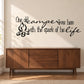 Wall decal with cursive quote and small camper icon in black