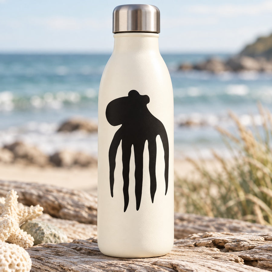 Octopus silhouette decal with black tentacle graphic on white bottle