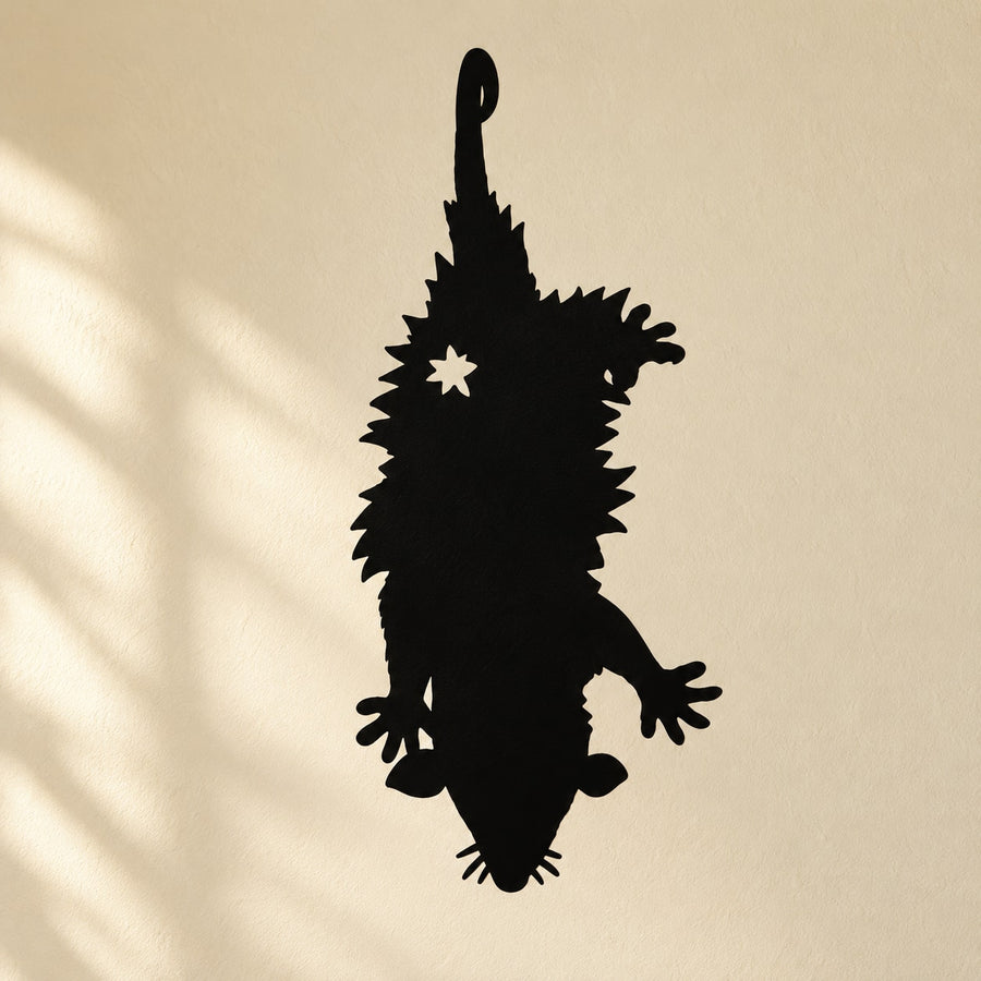 Hanging opossum decal, black silhouette with small white star detail