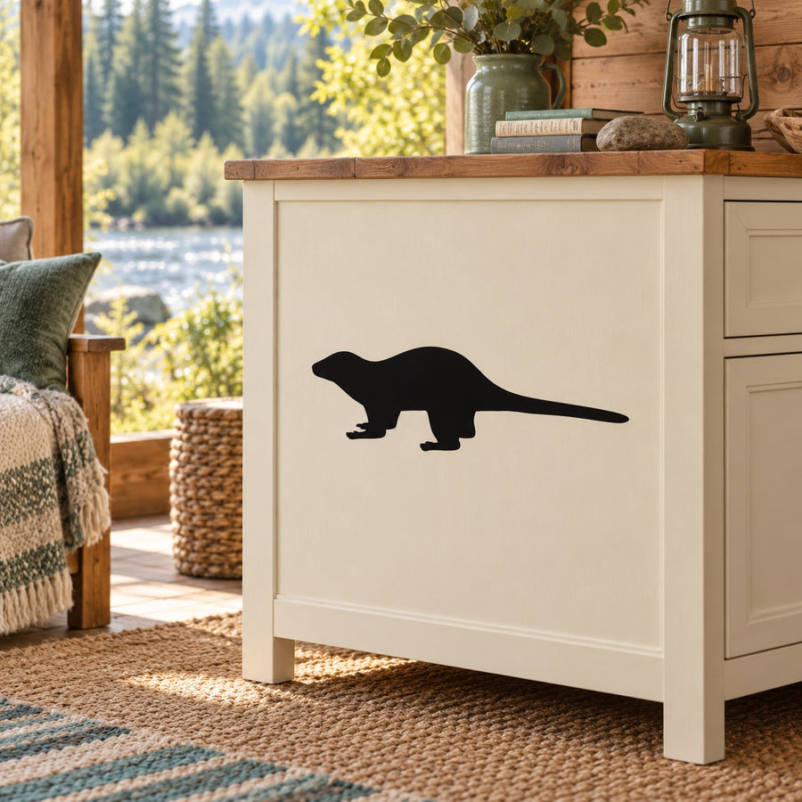 Standing otter wall decal, black silhouette on light surface