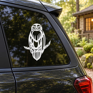 Black and white owl decal sticker on car window glass